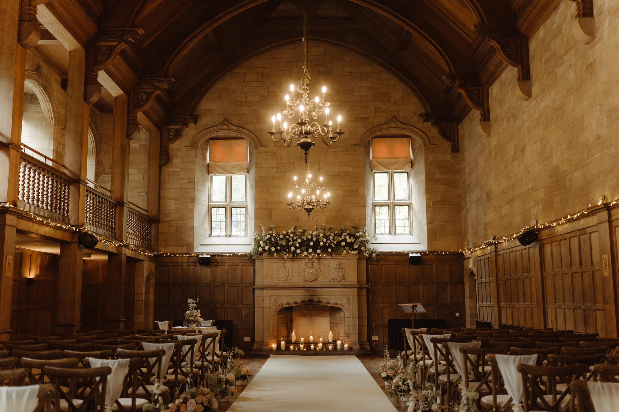 Warm light within the grand vaulted ballroom at Achnagairn Castle.