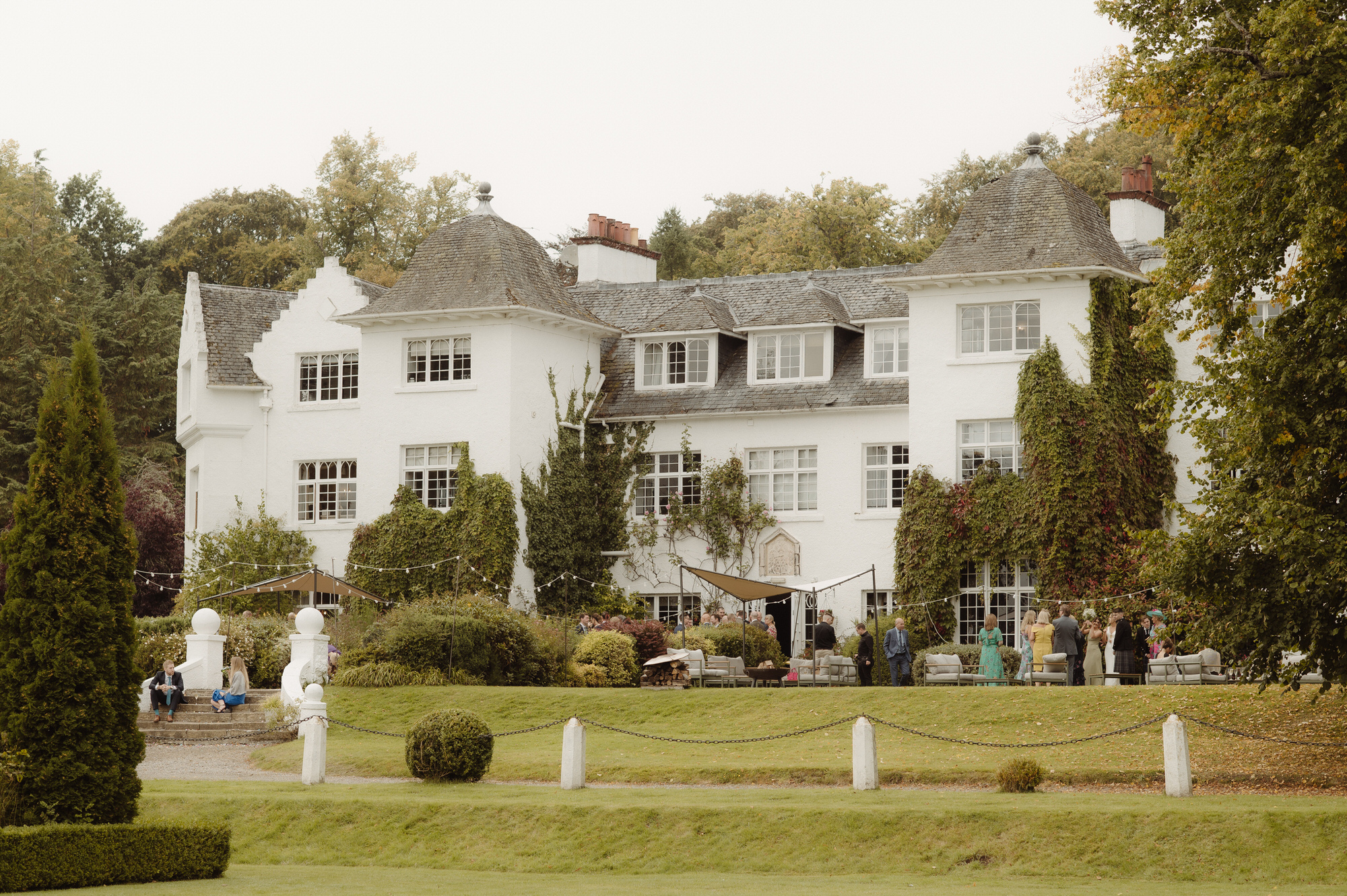 Wedding reception on the tiered terrace at Achnagairn Castle.