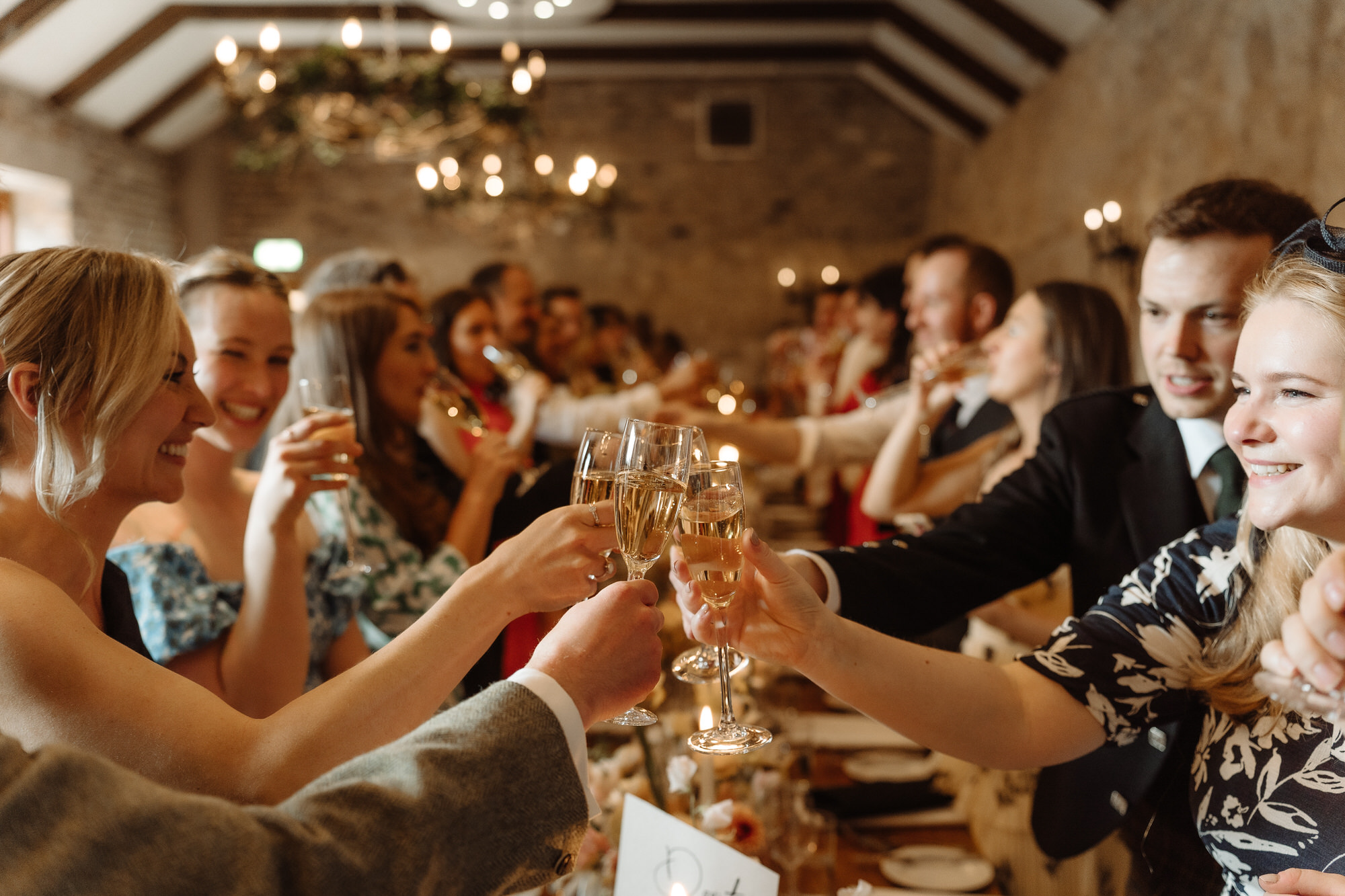 Guests enjoy wedding meal.