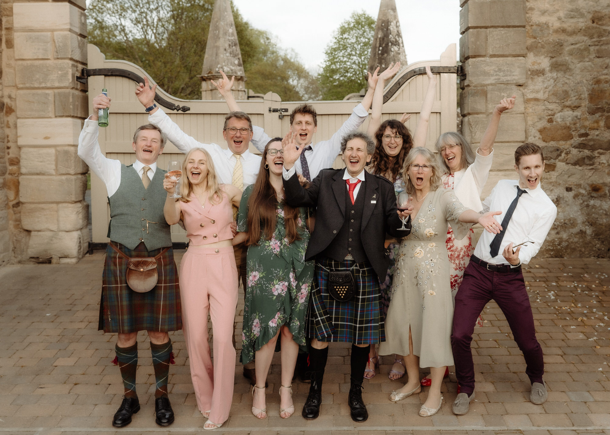 Group shot celebrate at Edinburgh wedding.